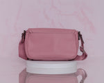 Bolsa Guess crossbody rosa palo